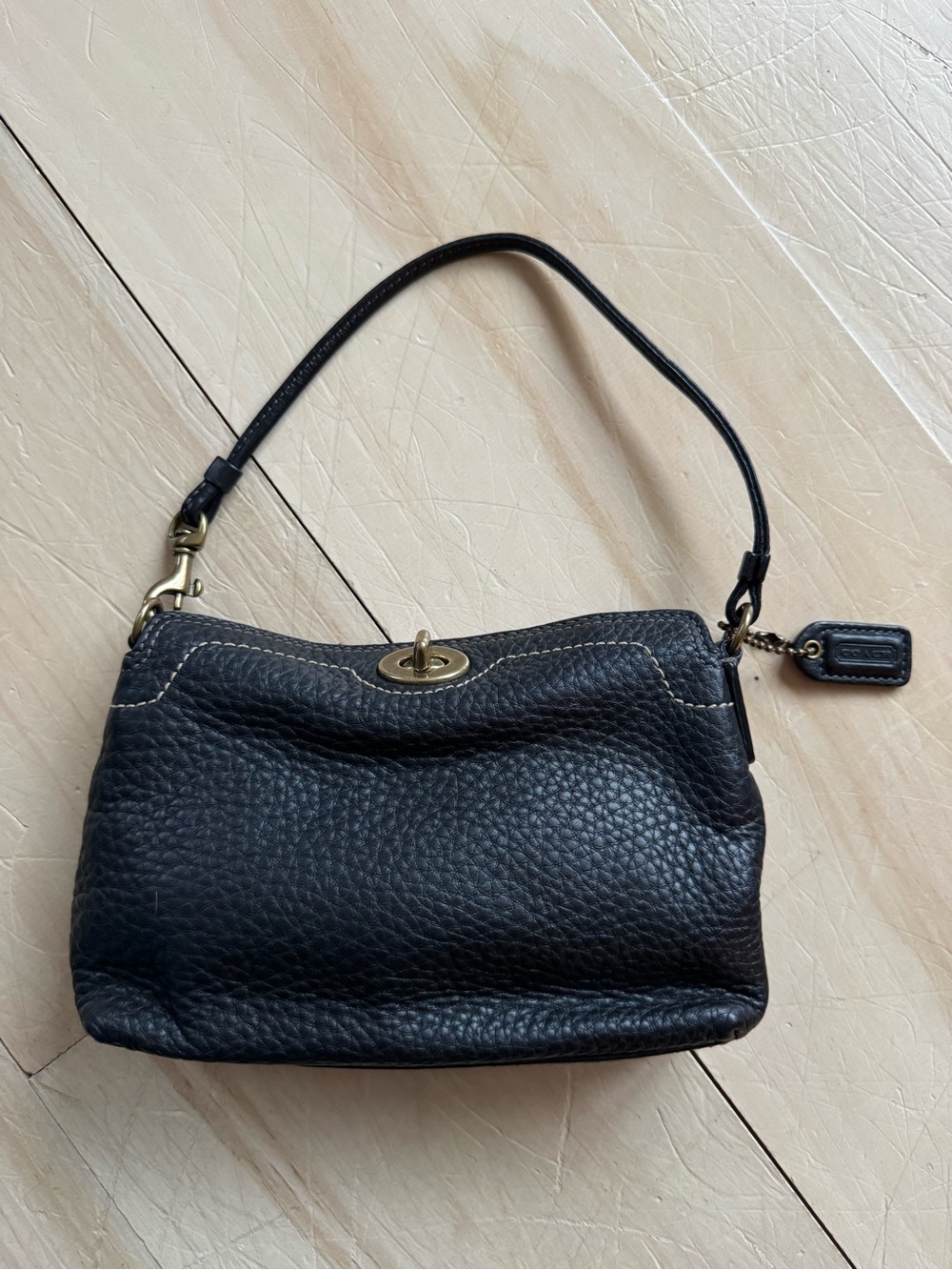 Coach Pebbled Leather Turnlock Wristlet